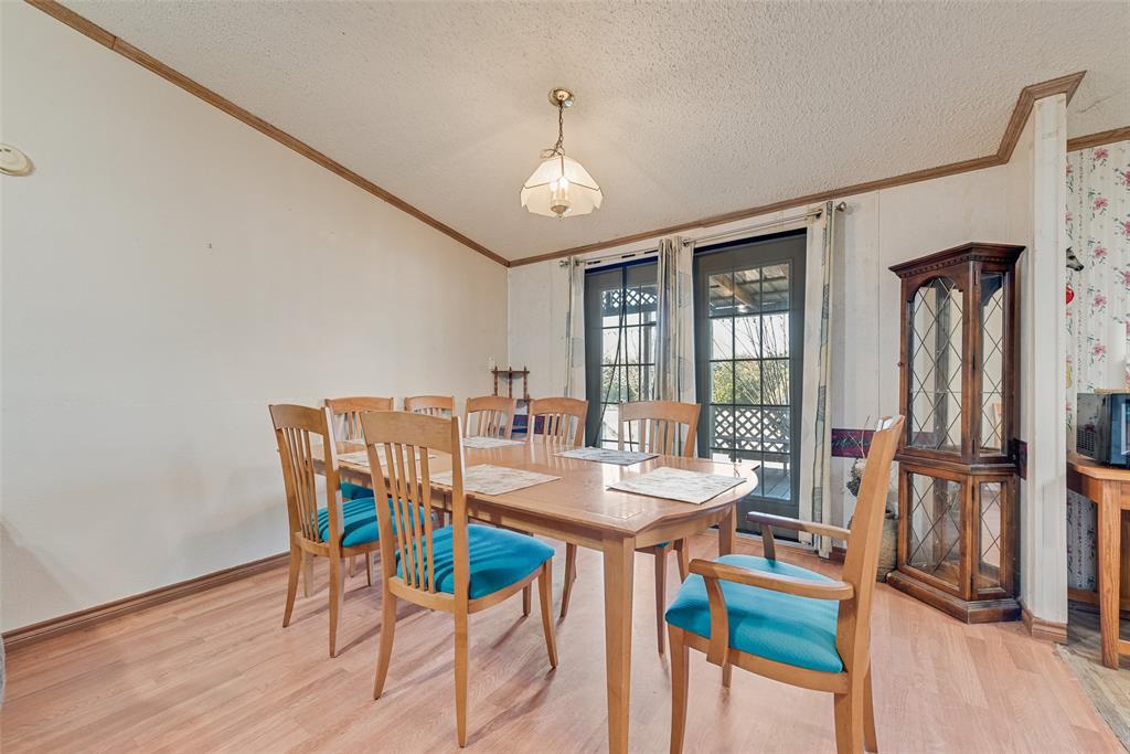 130 Meadowview Lane Point, TX 75472 - Photo 7 of 9 a view of a dining room with furniture and wooden floor