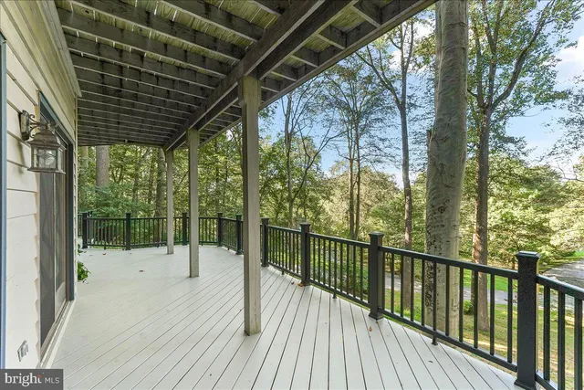 a aerial view of a house with yard and sitting area