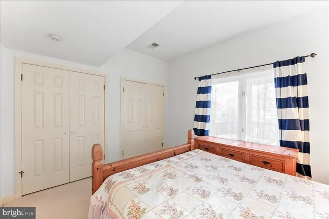 a view of a house with a yard and garage