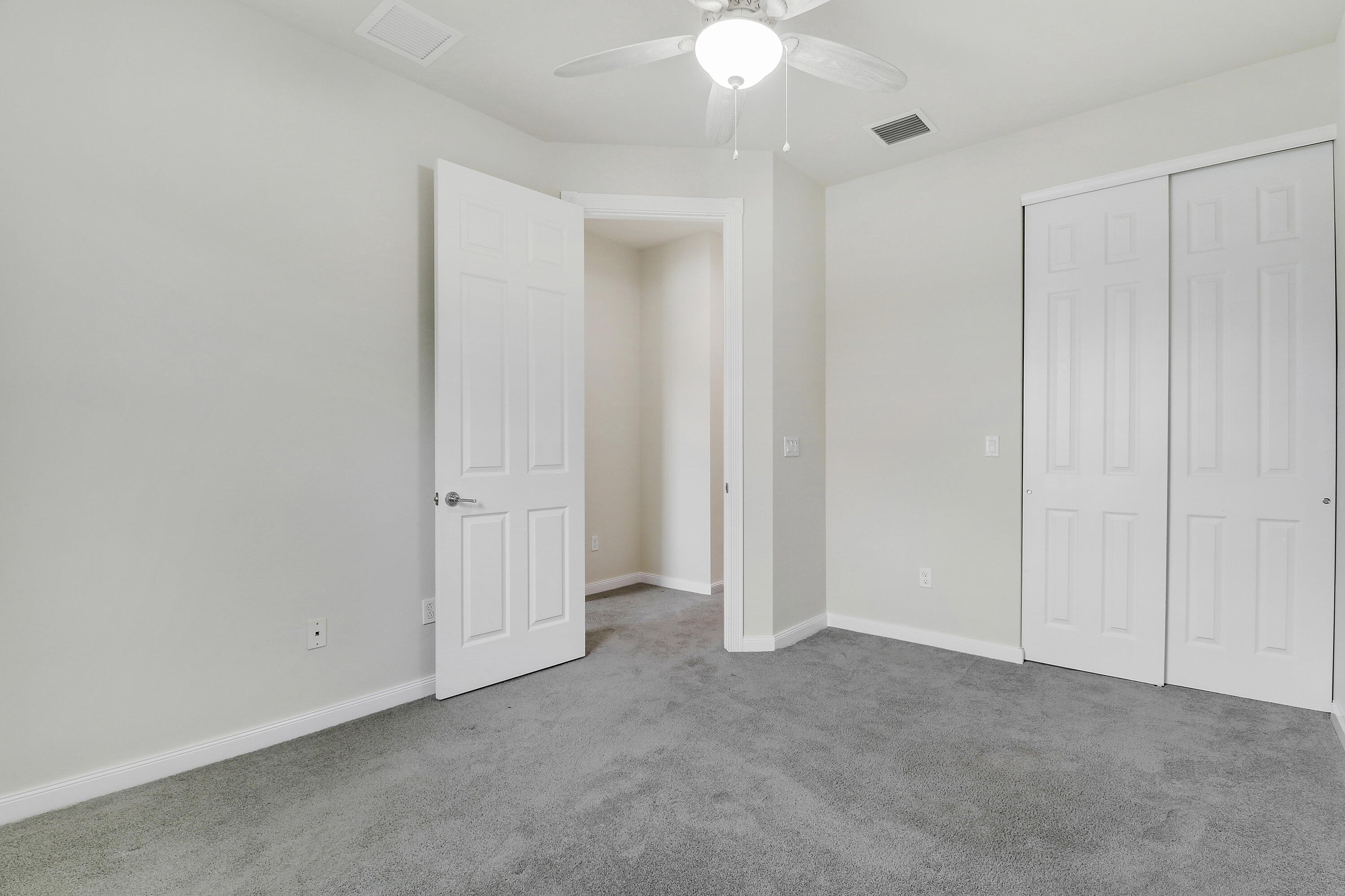 1043 Key Largo Street Jupiter, FL 33458 - Photo 24 of 46 a view of an empty room