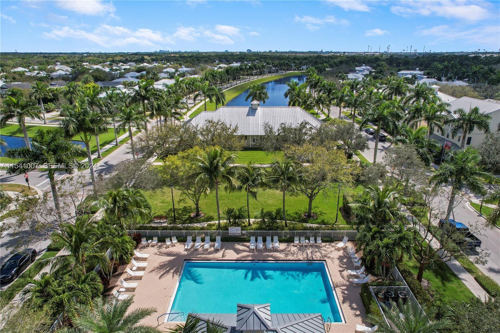 1043 Key Largo Street Jupiter, FL 33458 - Photo 44 of 46 a view of a city with a lake