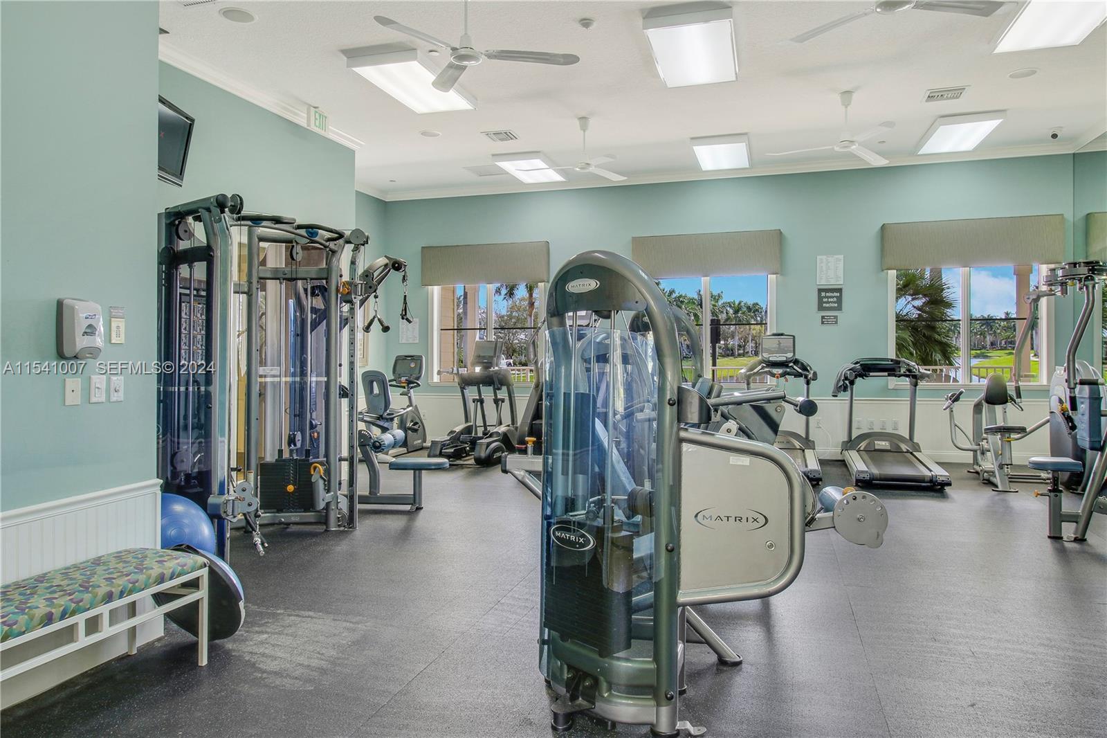 1043 Key Largo Street Jupiter, FL 33458 - Photo 45 of 46 a view of a room with gym equipment