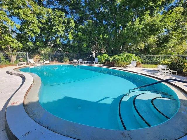 a view of a terrace with sitting area