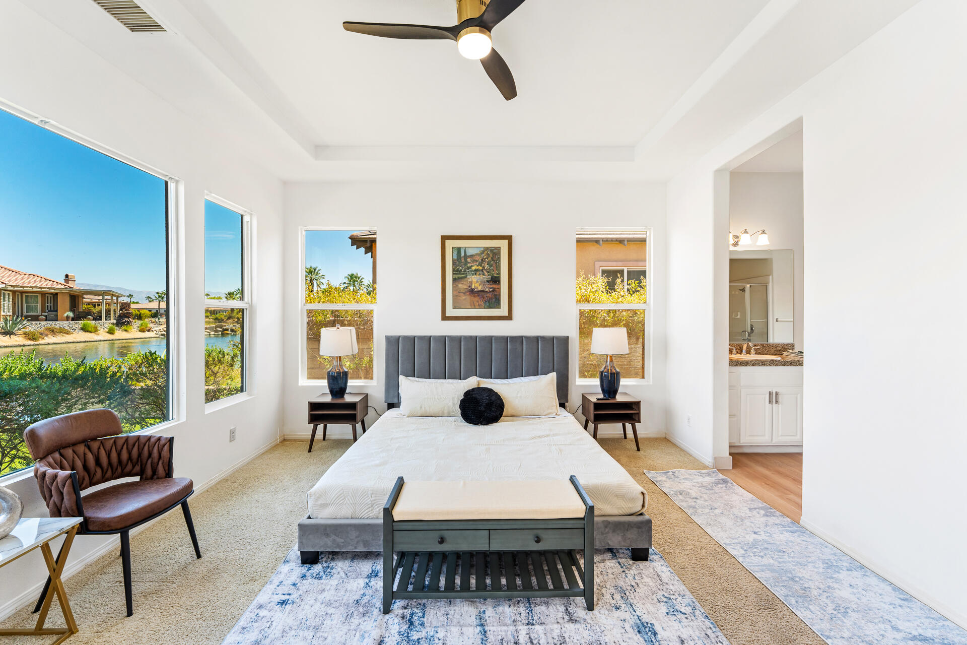 65 Shoreline Drive Rancho Mirage, CA 92270 - Photo 16 of 29 a living room with furniture rug and window