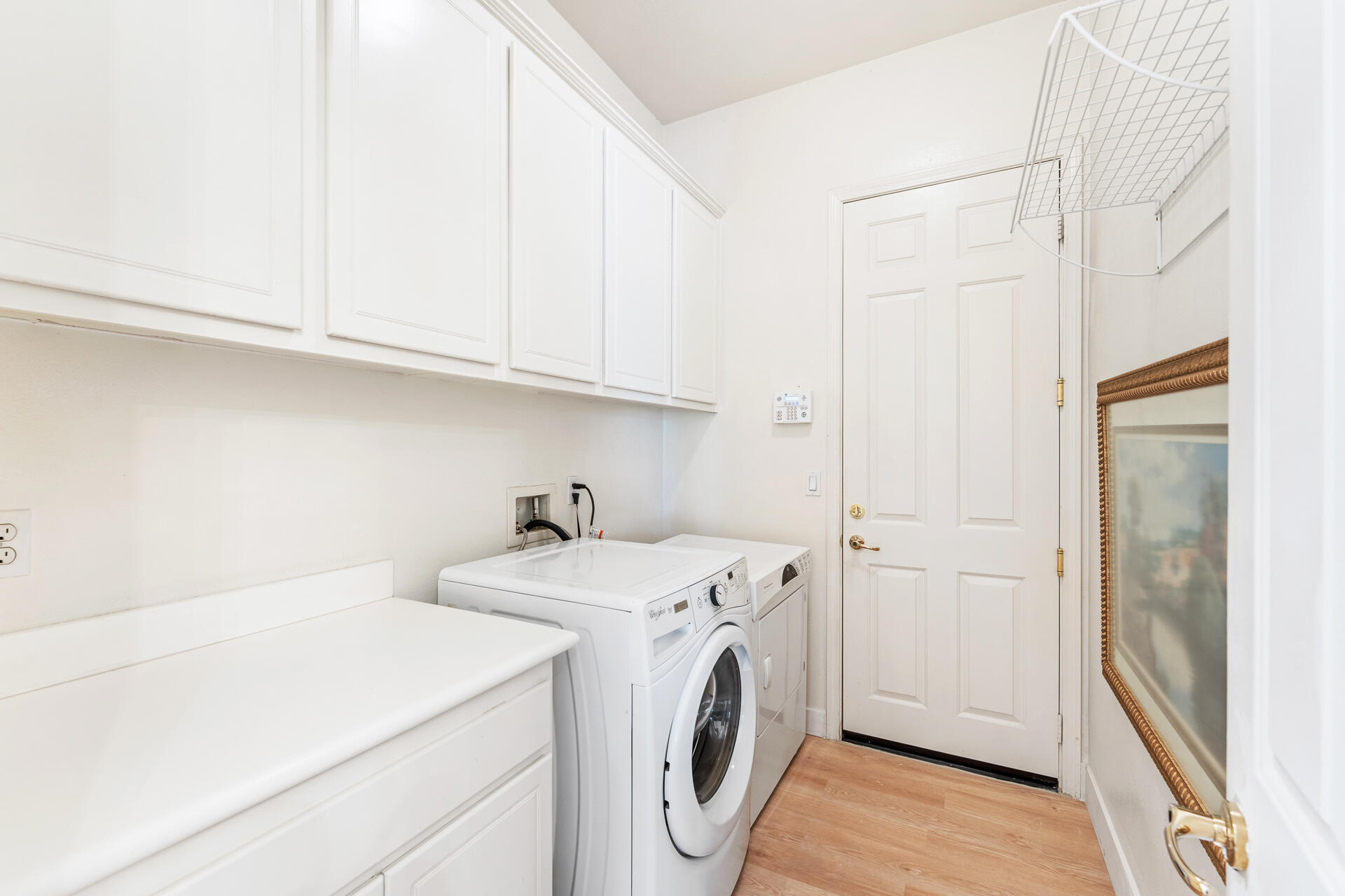 65 Shoreline Drive Rancho Mirage, CA 92270 - Photo 19 of 29 a utility room with dryer and washer