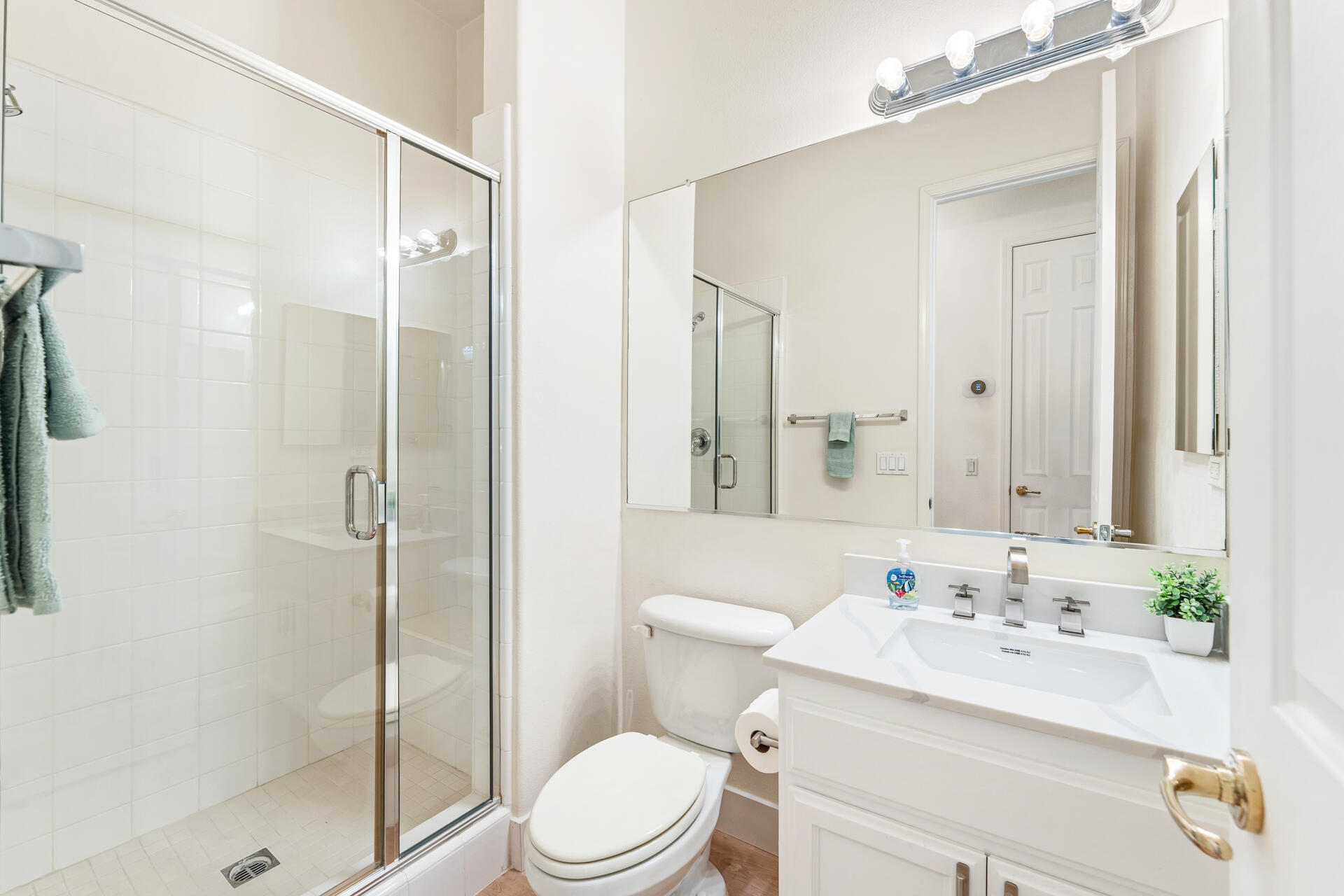 65 Shoreline Drive Rancho Mirage, CA 92270 - Photo 20 of 29 a bathroom with a sink a toilet and shower