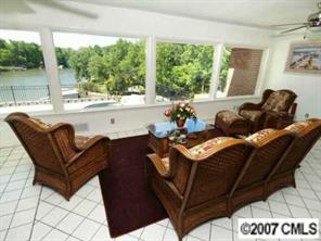 9921 Withers Road Charlotte, NC 28278 - Photo 3 of 8 a living room with furniture and a large window