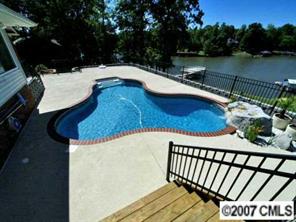 9921 Withers Road Charlotte, NC 28278 - Photo 7 of 8 a view of swimming pool and lake view