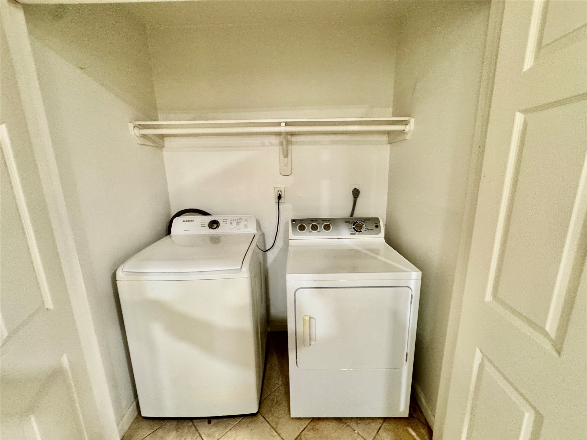 7203 Addicks Clodine Road Houston, TX 77083 - Photo 11 of 21 a utility room with dryer and washer