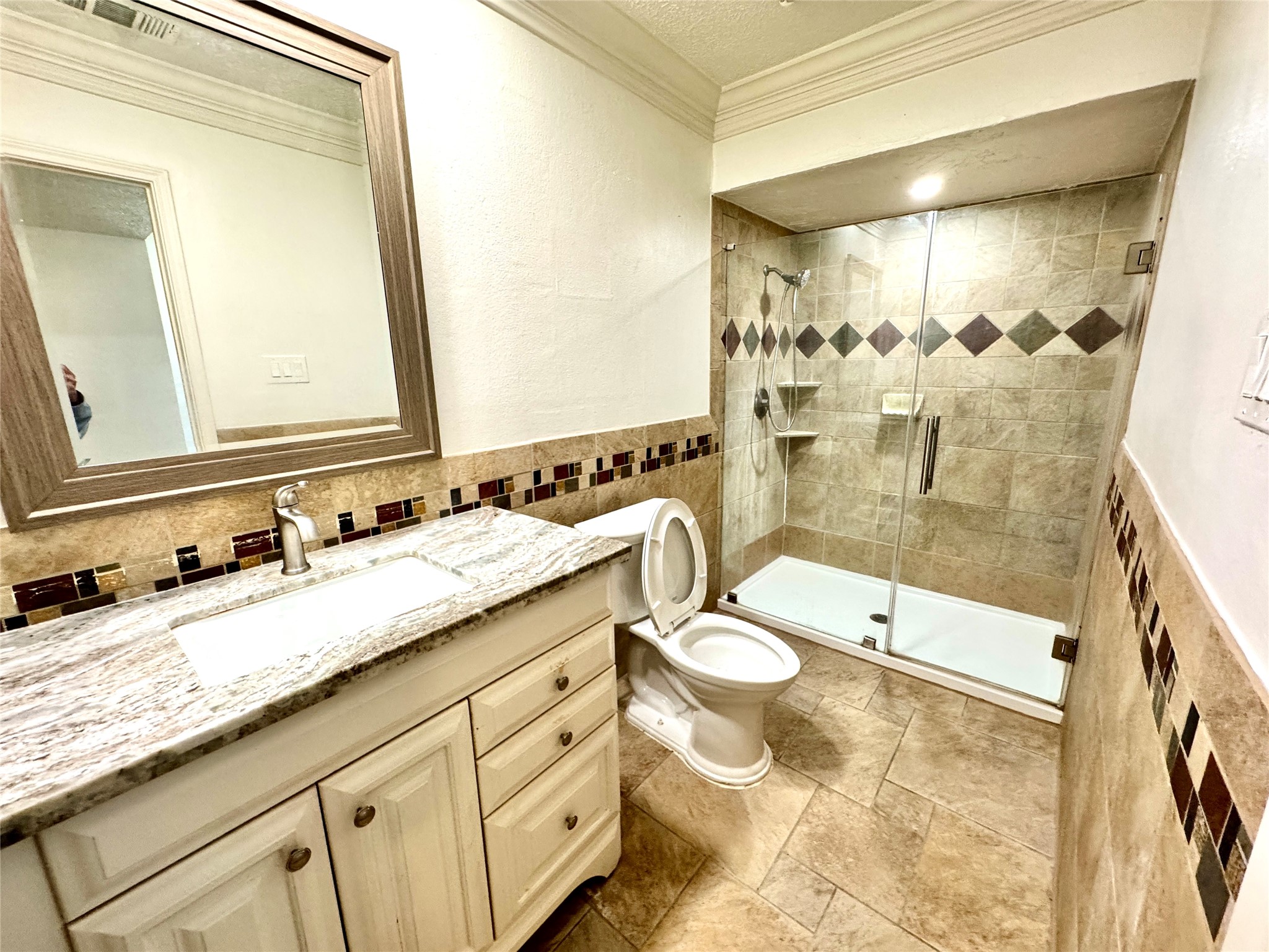 7203 Addicks Clodine Road Houston, TX 77083 - Photo 17 of 21 a bathroom with a granite countertop sink and a mirror