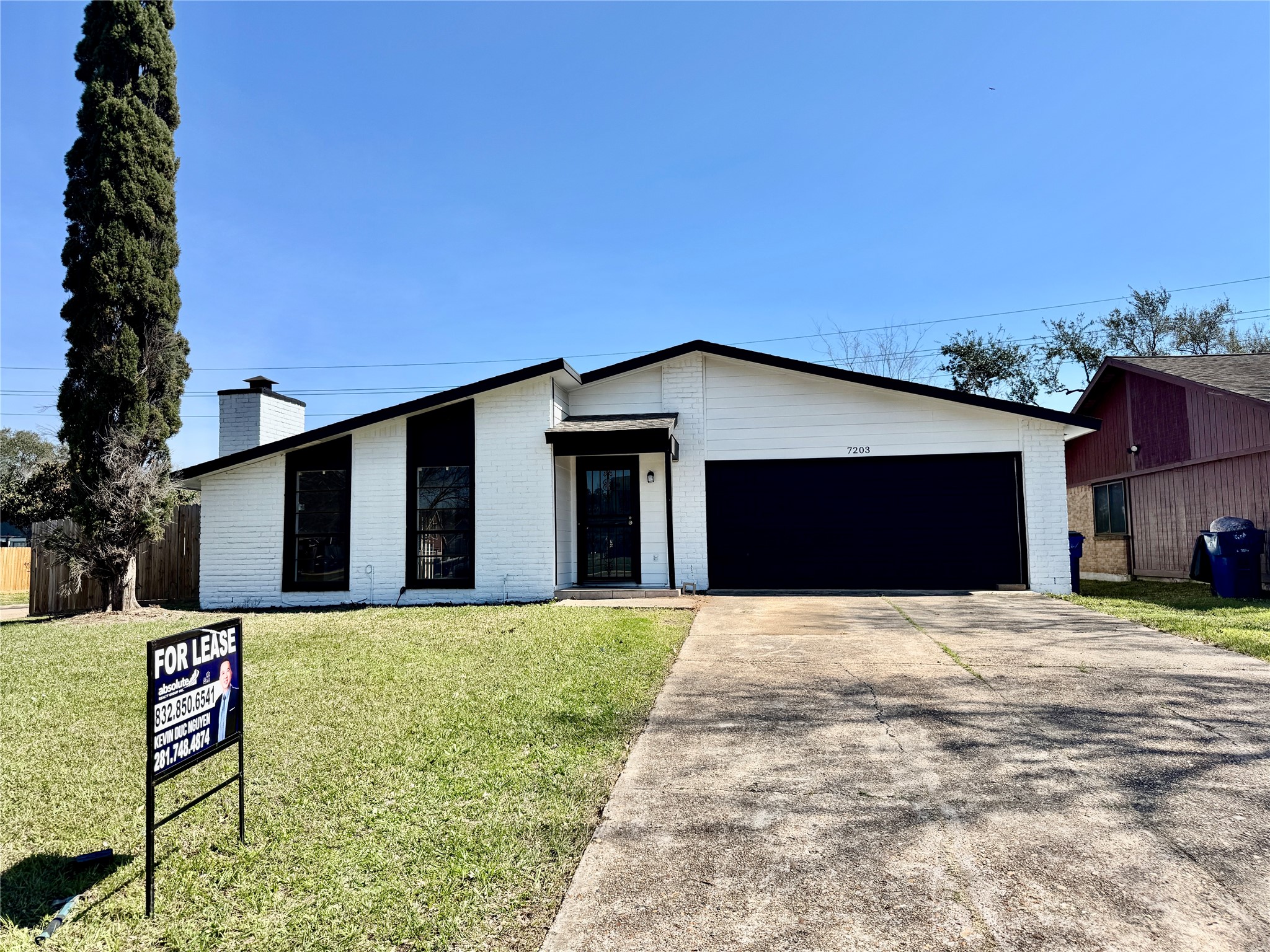 7203 Addicks Clodine Road Houston, TX 77083 - Photo 2 of 21 a house with yard in front of it