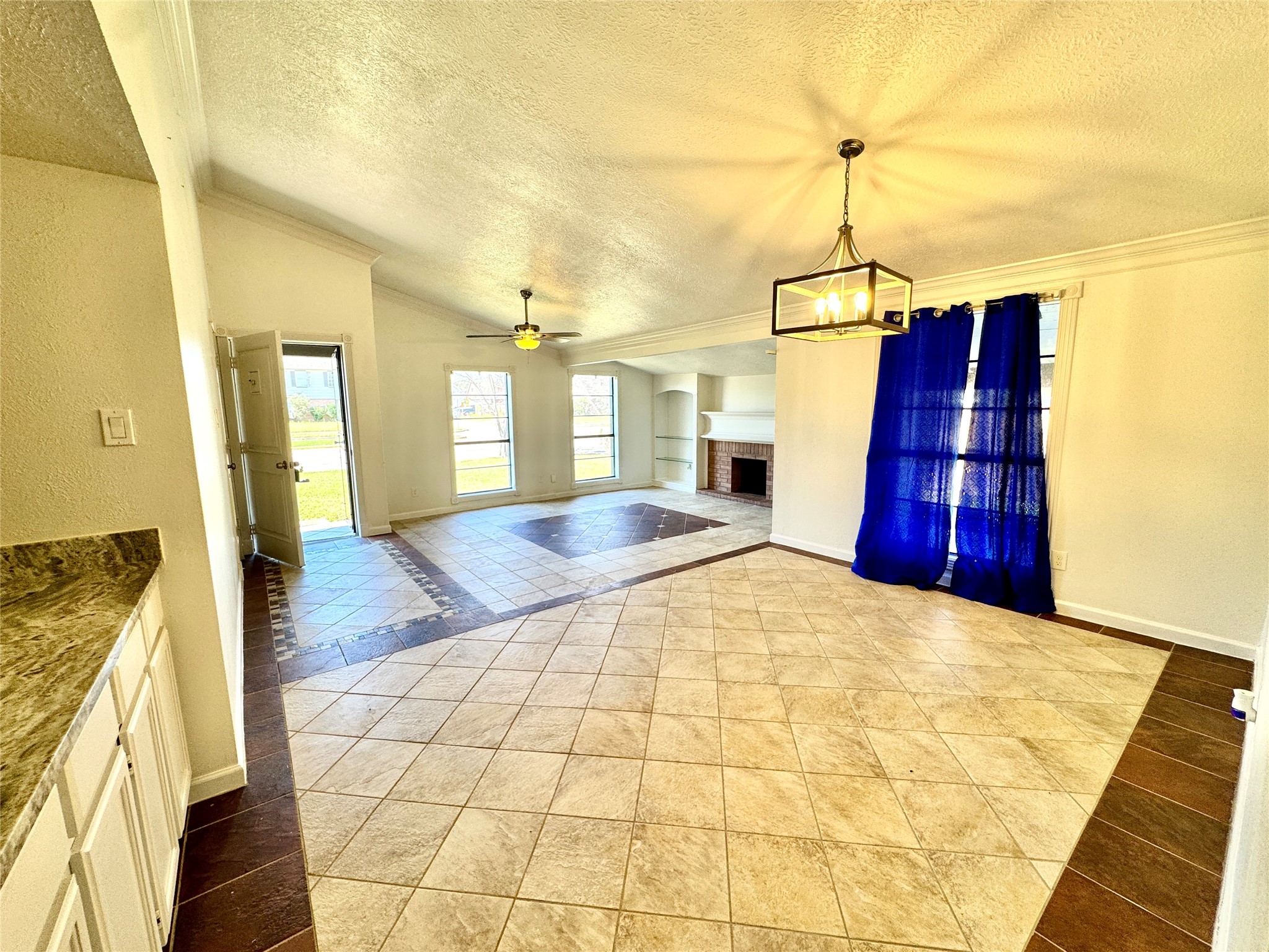7203 Addicks Clodine Road Houston, TX 77083 - Photo 5 of 21 a view of a kitchen with a sink and wooden floor