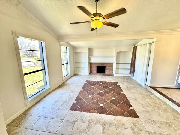 a view of empty room with windows