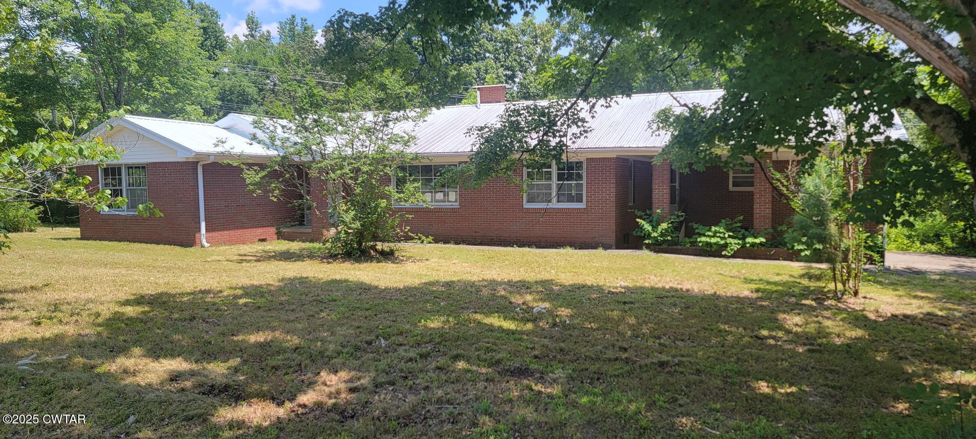 a front view of house with yard