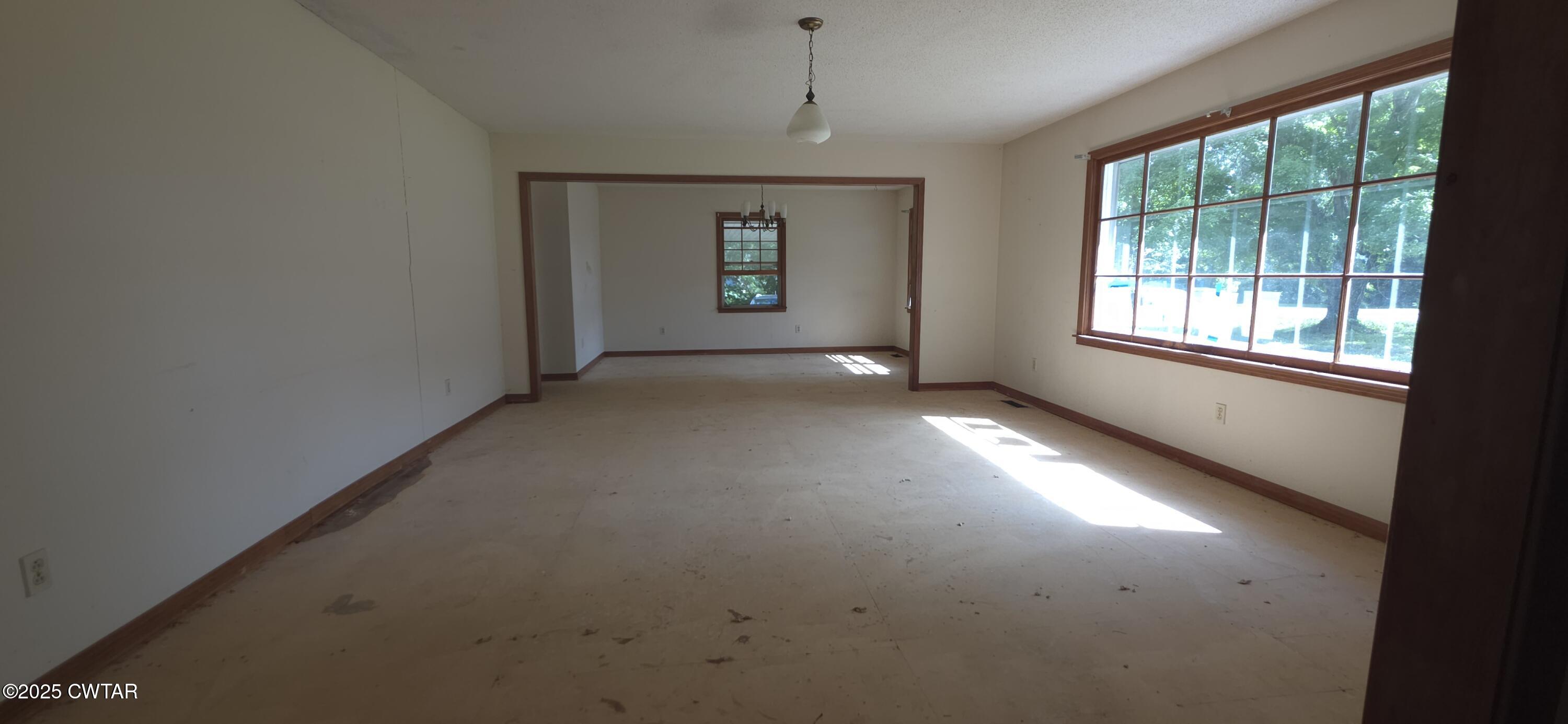 224 Bible Grove Road Lexington, TN 38351 - Photo 6 of 13 an empty room with windows