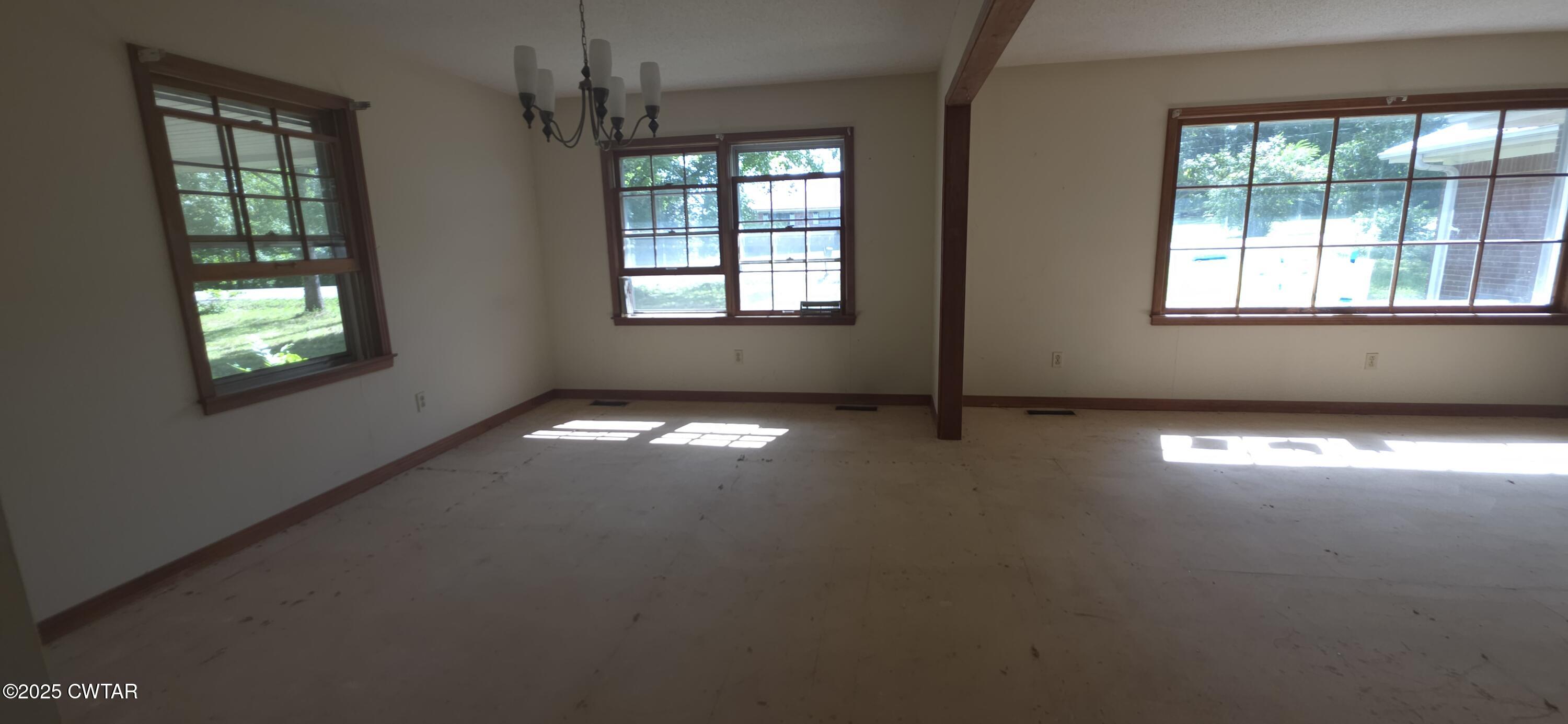 224 Bible Grove Road Lexington, TN 38351 - Photo 7 of 13 a view of empty room with window