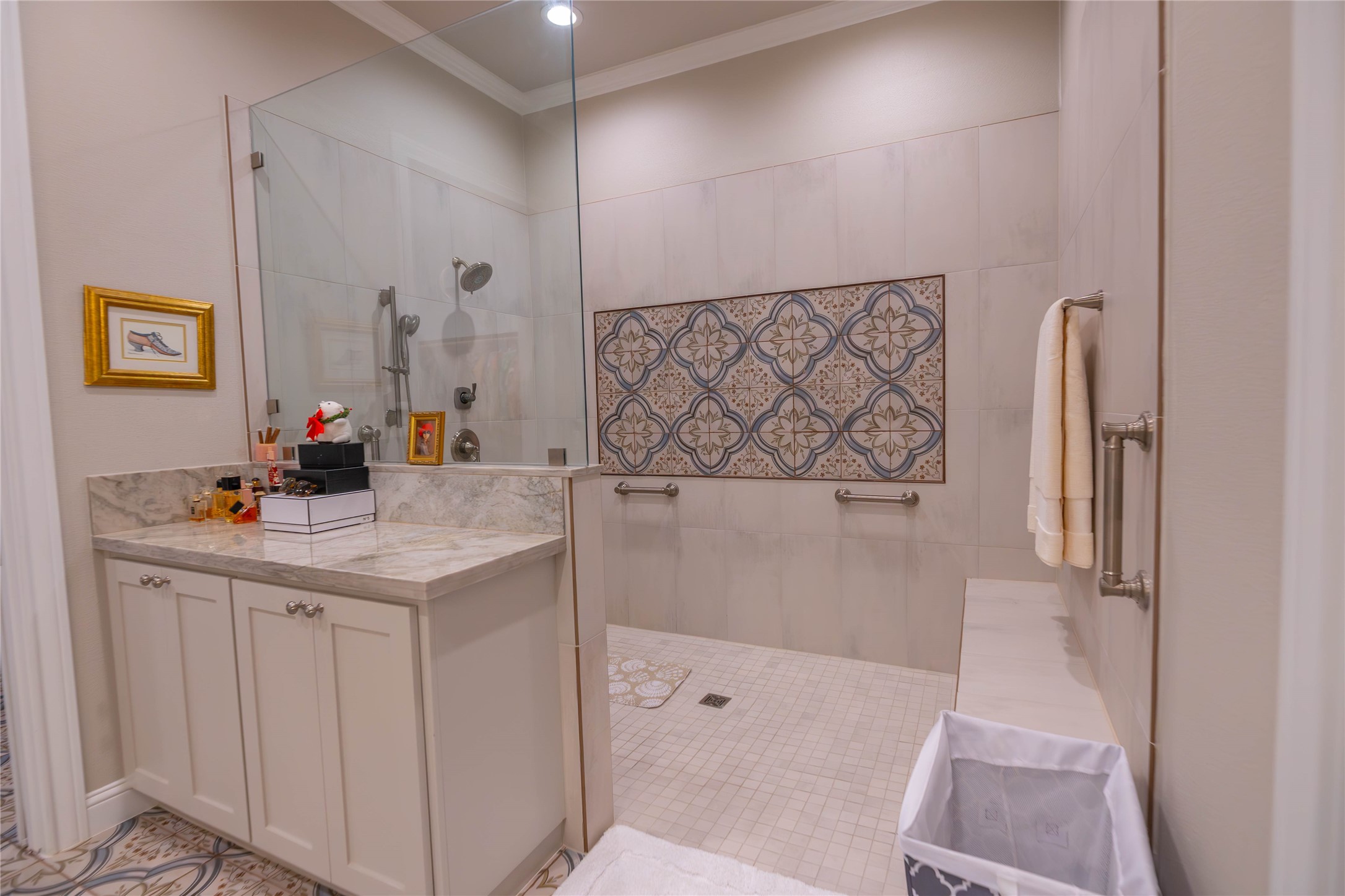 10614 Moonlight Drive Houston, TX 77096 - Photo 17 of 27 a bathroom with a sink a mirror and a shower