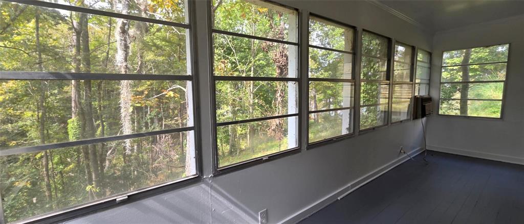 333 Canal Street Ringgold, LA 71068 - Photo 12 of 33 a view of empty room with wooden floor and fan
