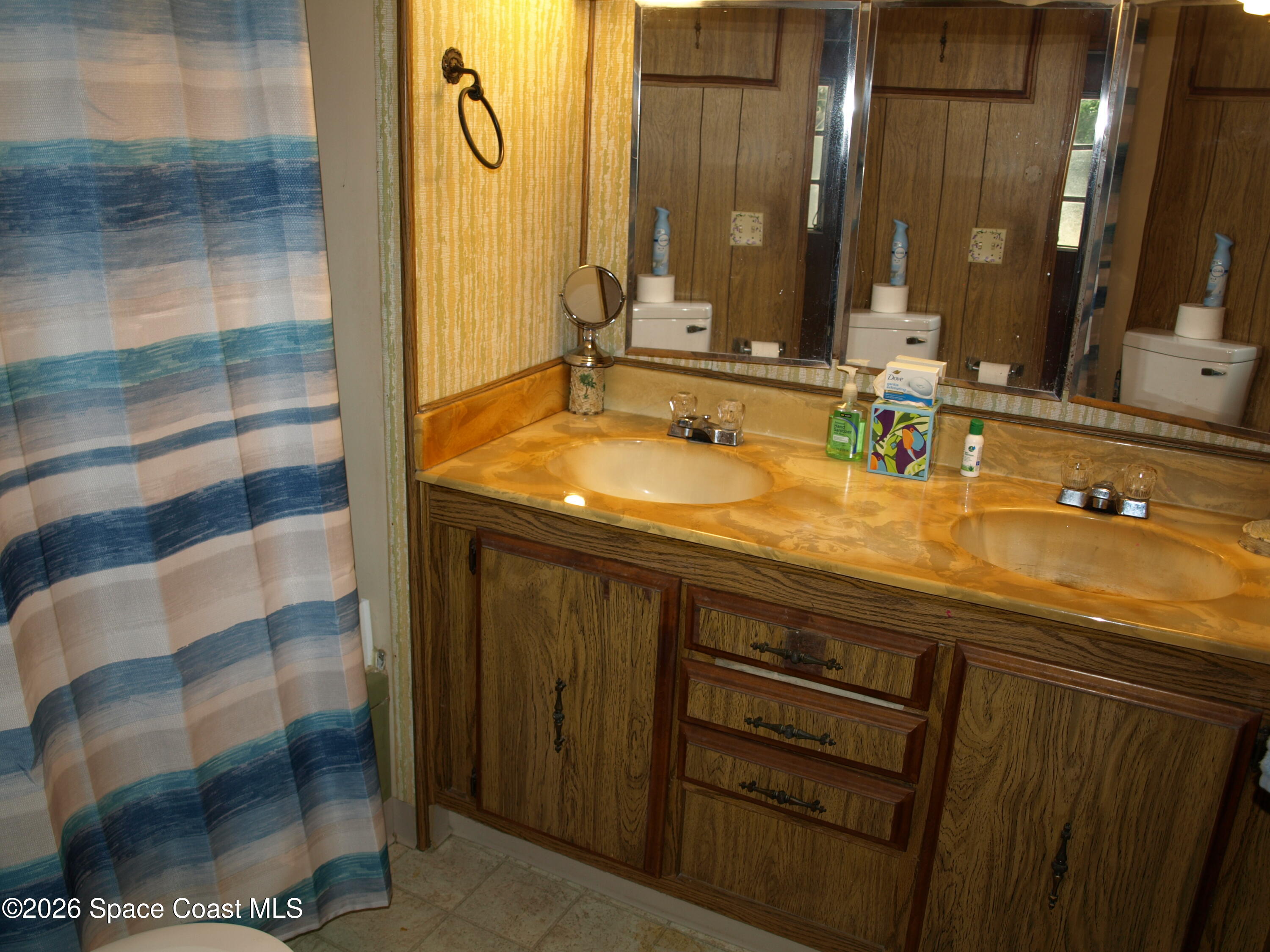 130 Palm Drive Georgetown, FL 32139 - Photo 18 of 23 a bathroom with a sink and a mirror