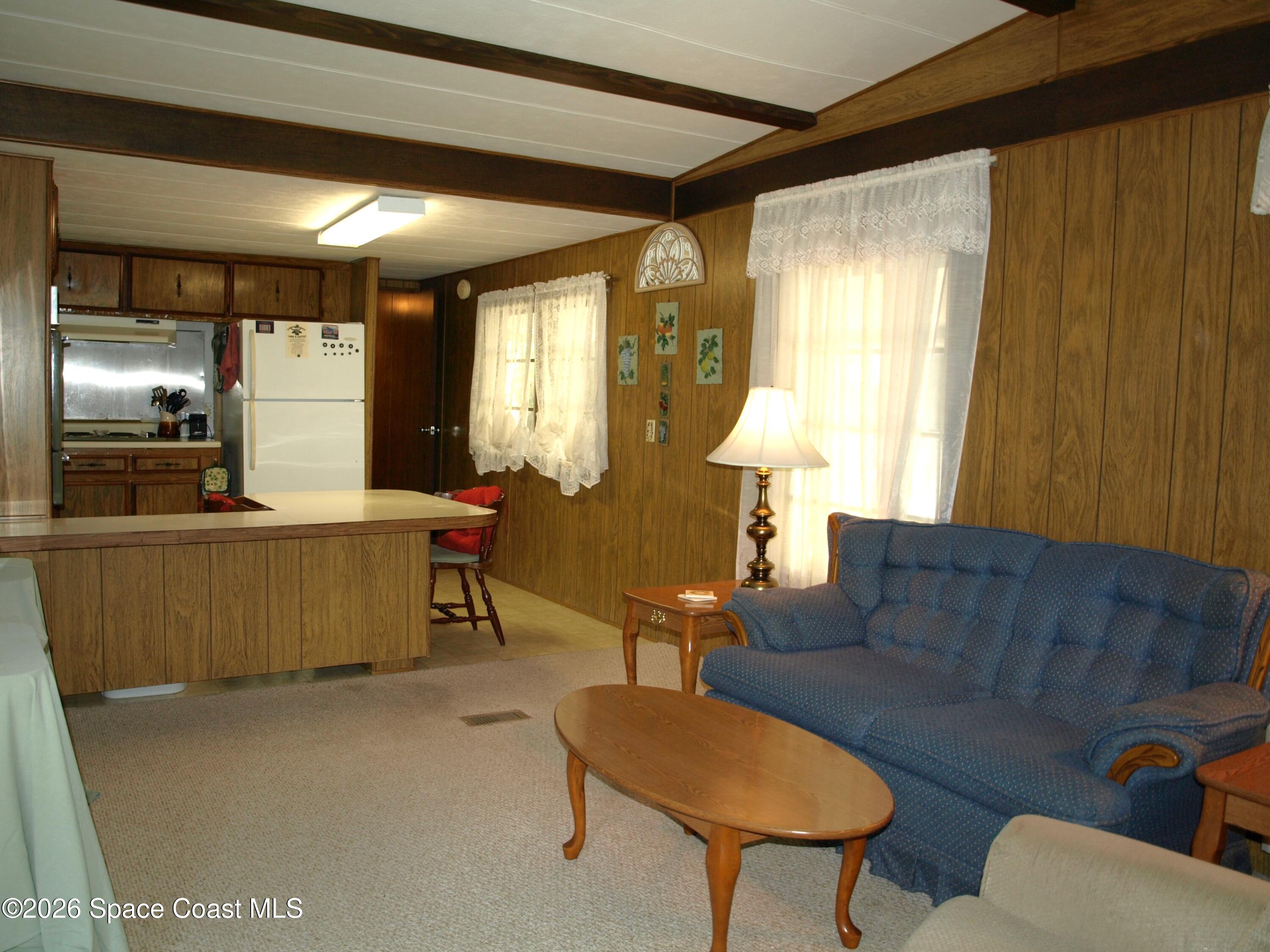 130 Palm Drive Georgetown, FL 32139 - Photo 7 of 23 a living room with furniture and a large window