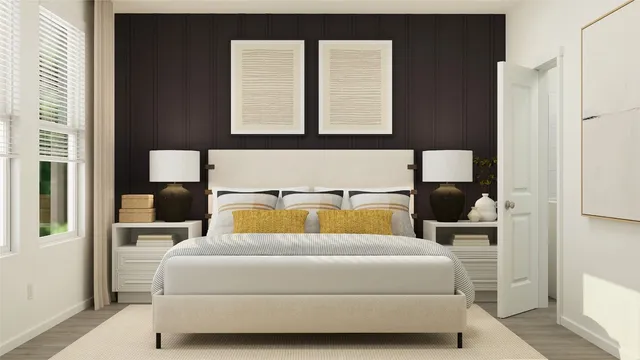 a bedroom with a bed and window