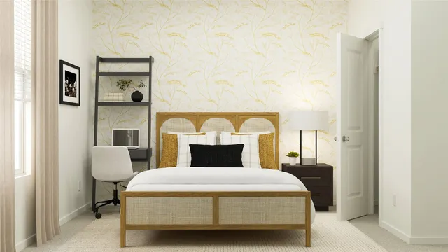 a bedroom with a bed chair and wall painting