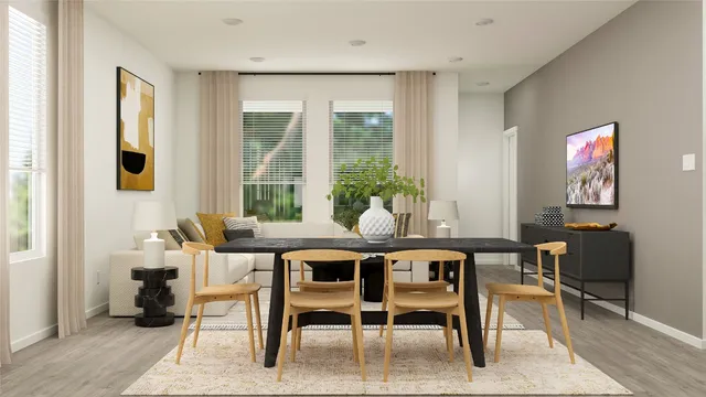 a dining room with furniture and wooden floor