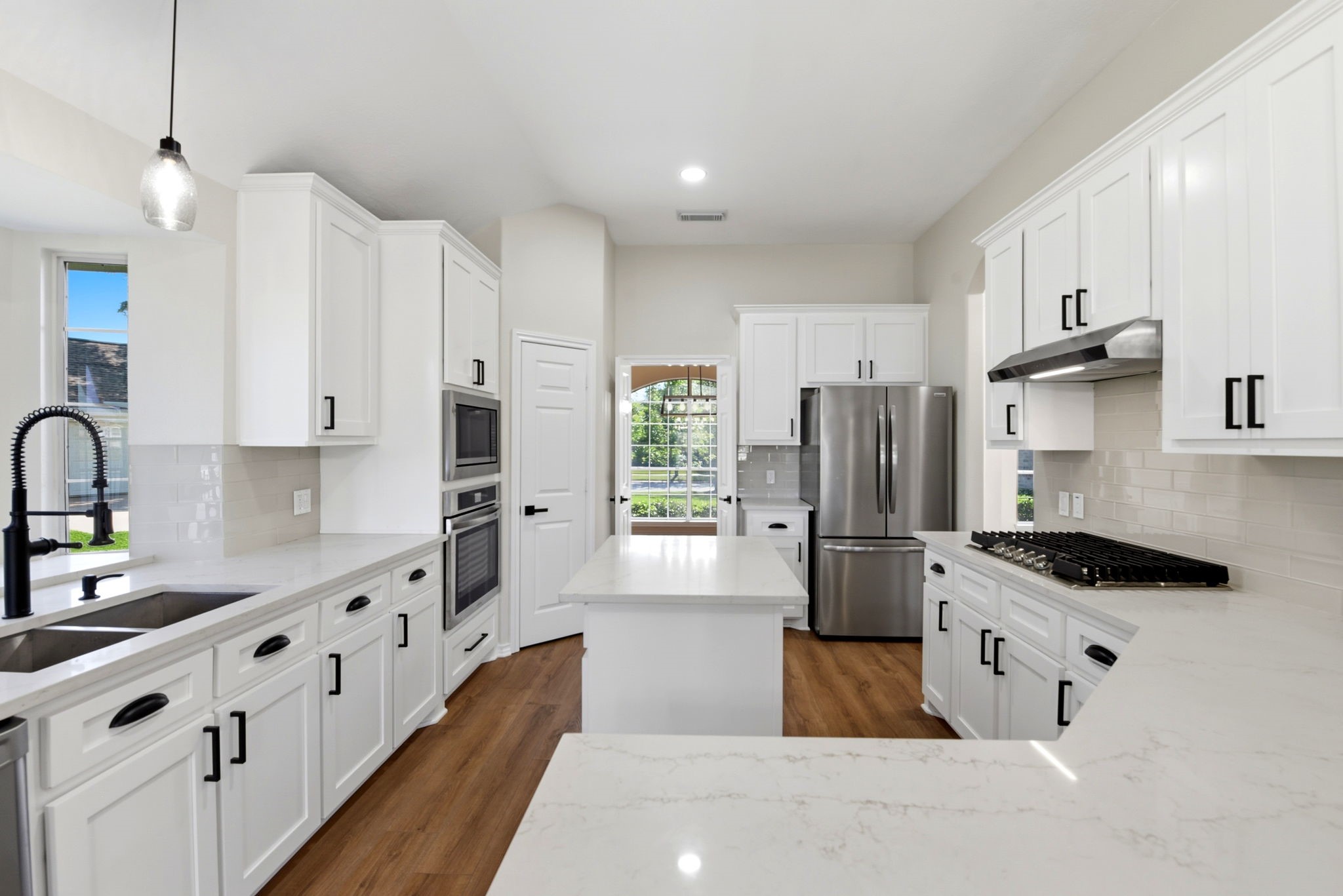 29819 South Legends Village Circle Spring, TX 77386 - Photo 14 of 48 a kitchen with stainless steel appliances granite countertop a refrigerator a stove and a sink