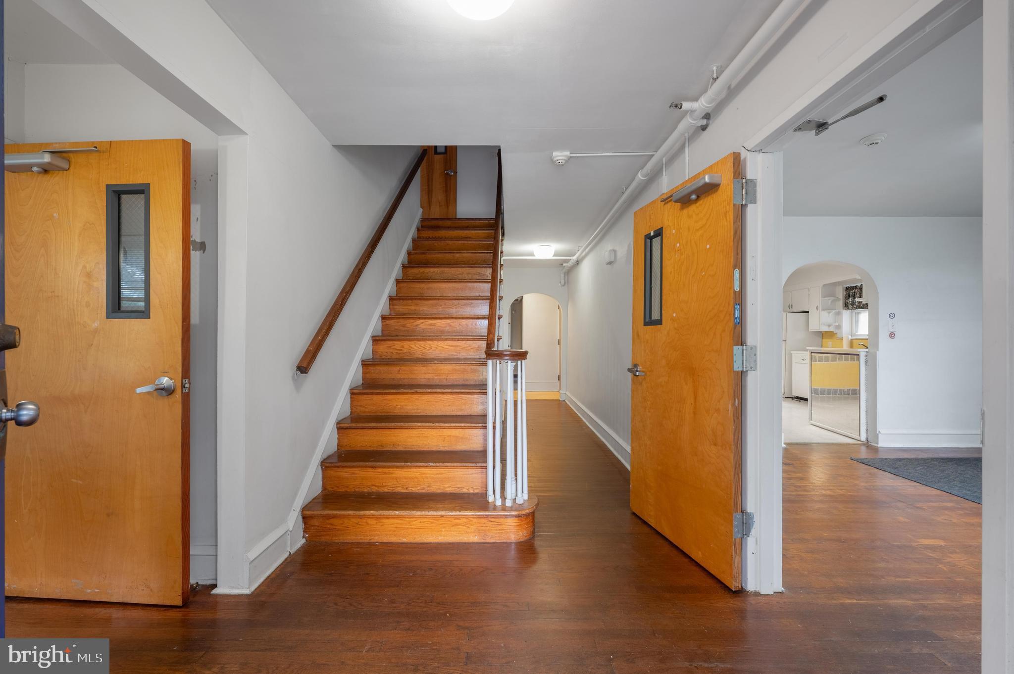 189 Watsontown Road Berlin, NJ 08009 - Photo 11 of 35 a view of a hallway with wooden floor and entryway