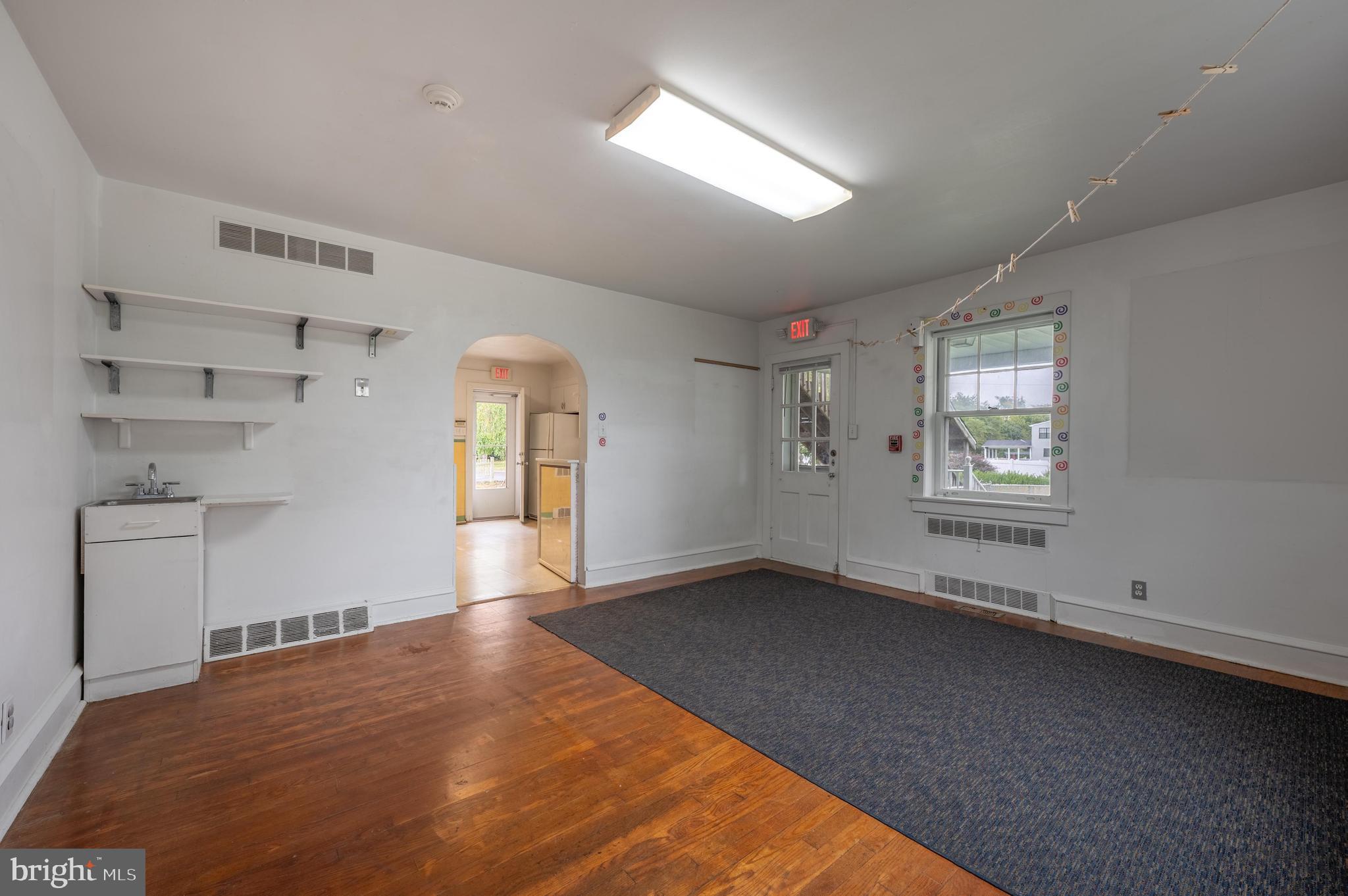 189 Watsontown Road Berlin, NJ 08009 - Photo 15 of 35 wooden floor in an empty room with a window