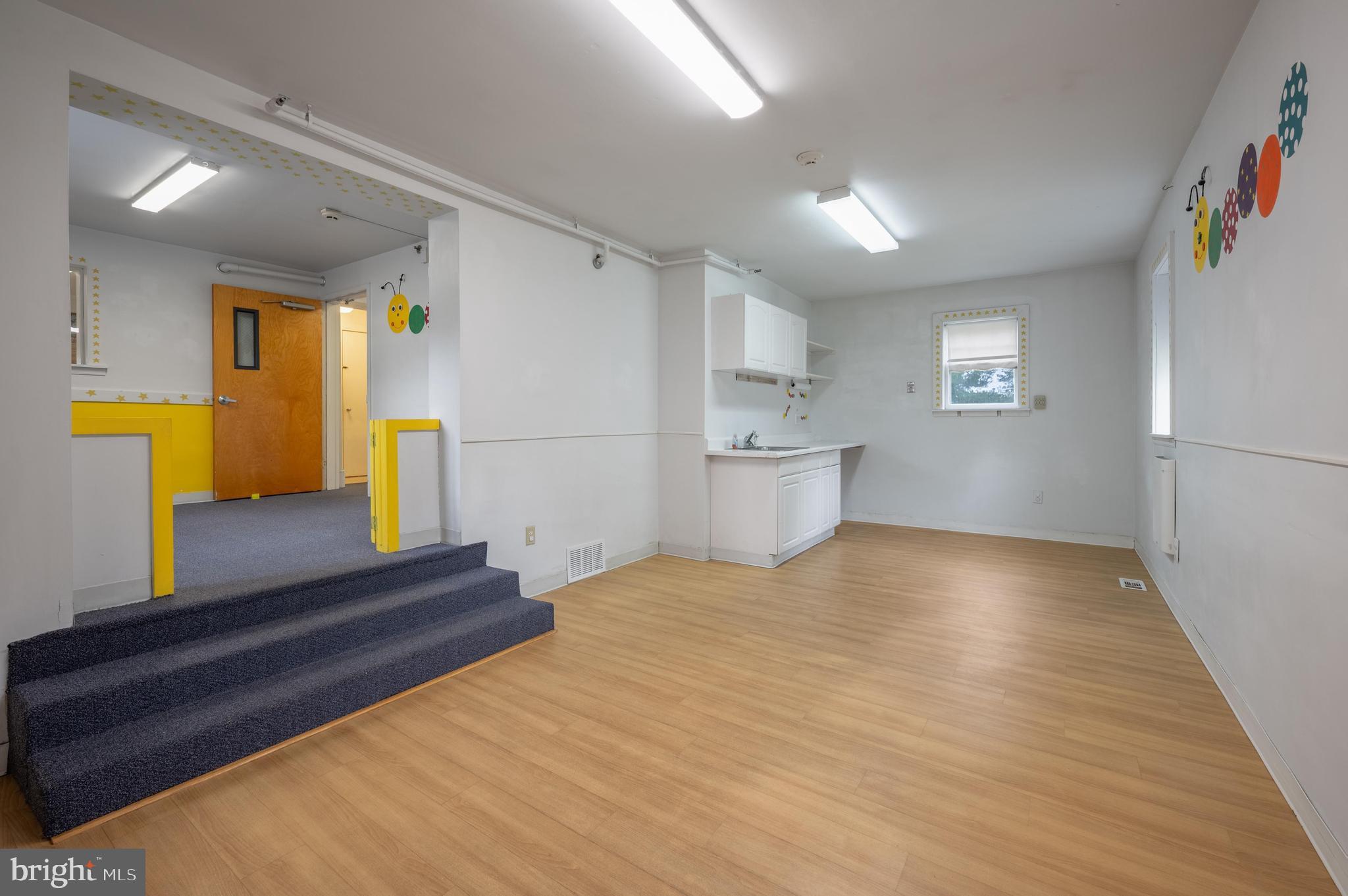 189 Watsontown Road Berlin, NJ 08009 - Photo 20 of 35 a view of kitchen and hall with wooden floor