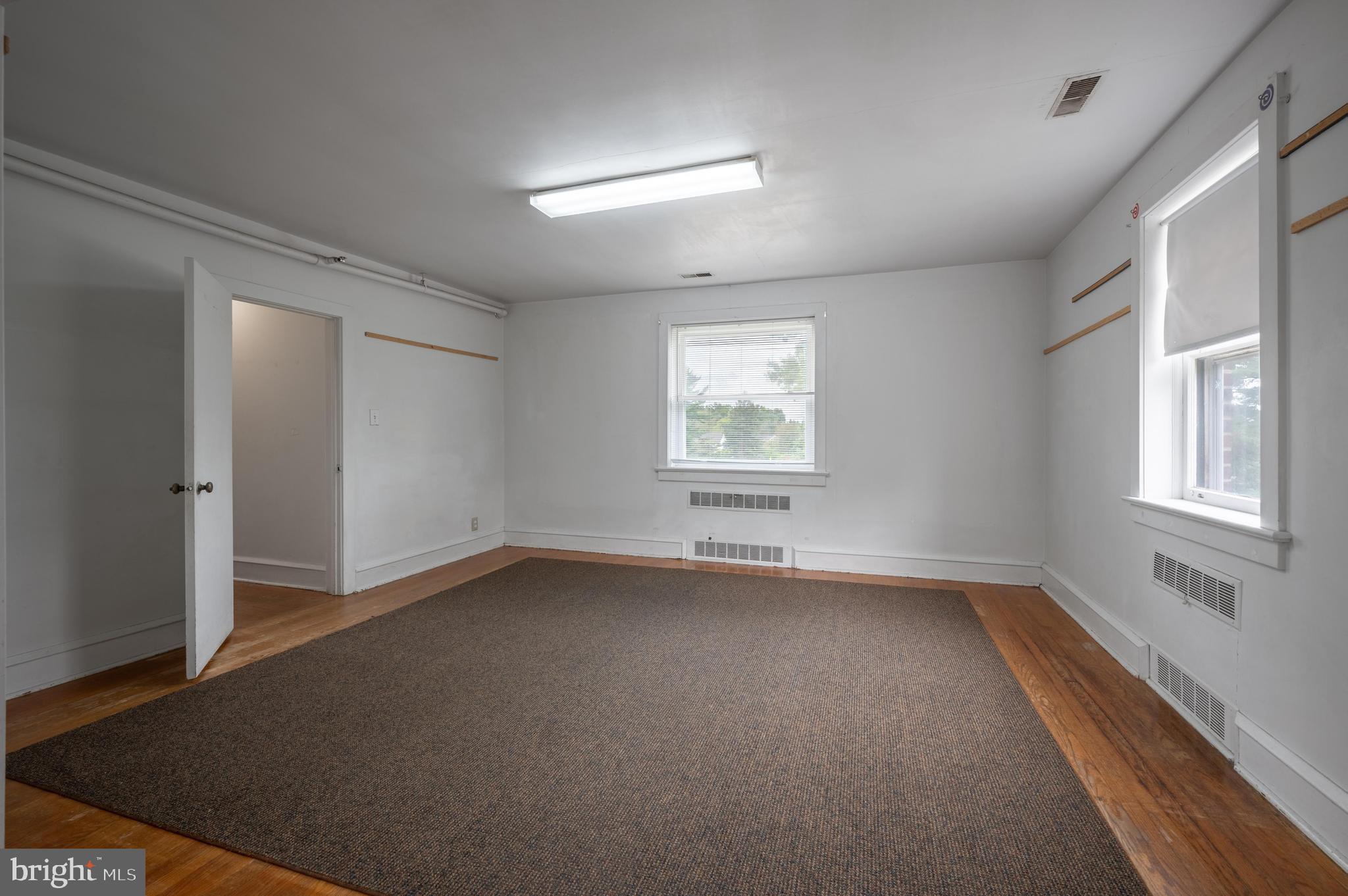 189 Watsontown Road Berlin, NJ 08009 - Photo 27 of 35 an empty room with a empty space and windows