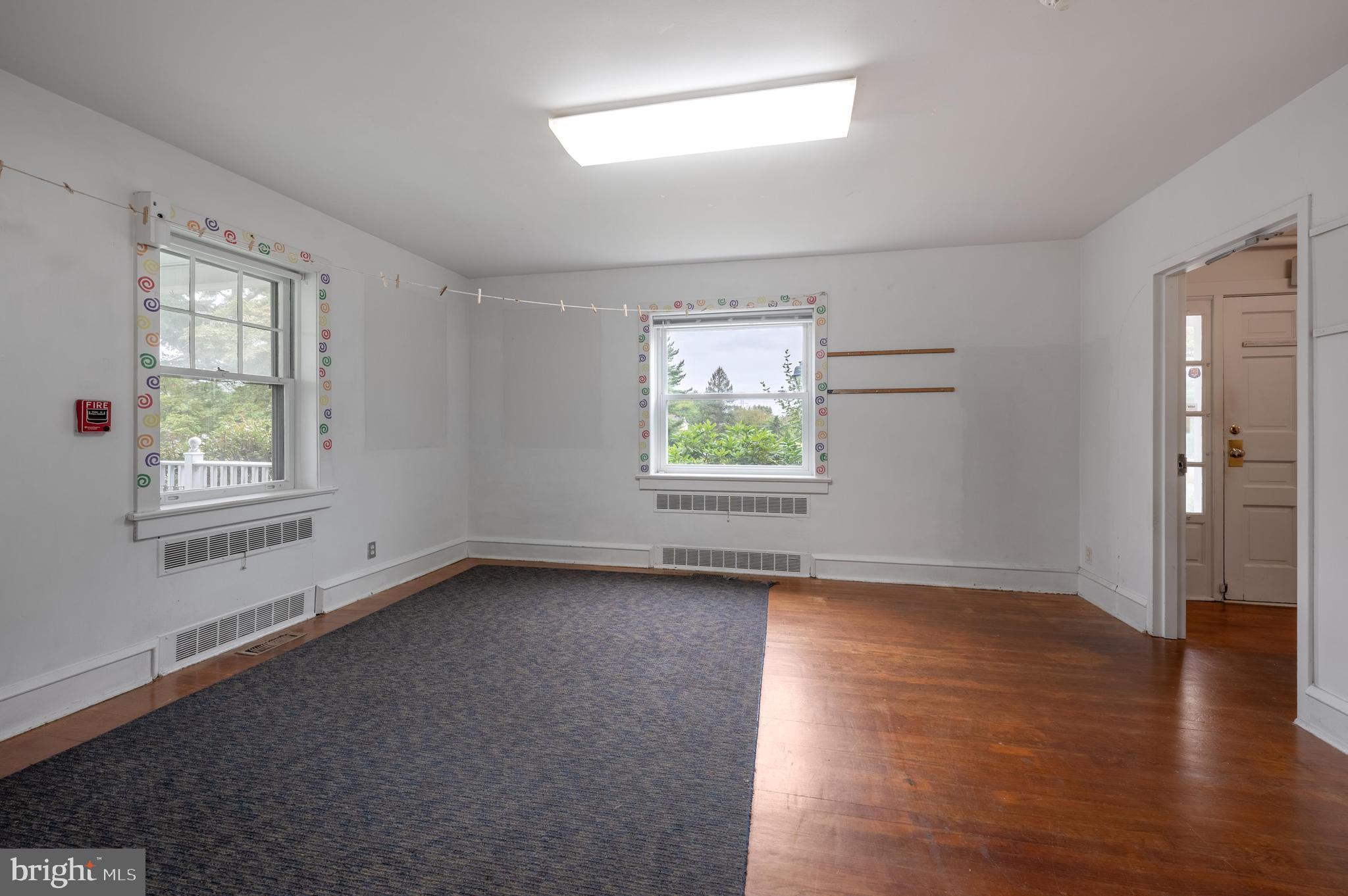 189 Watsontown Road Berlin, NJ 08009 - Photo 28 of 35 an empty room with wooden floor and windows