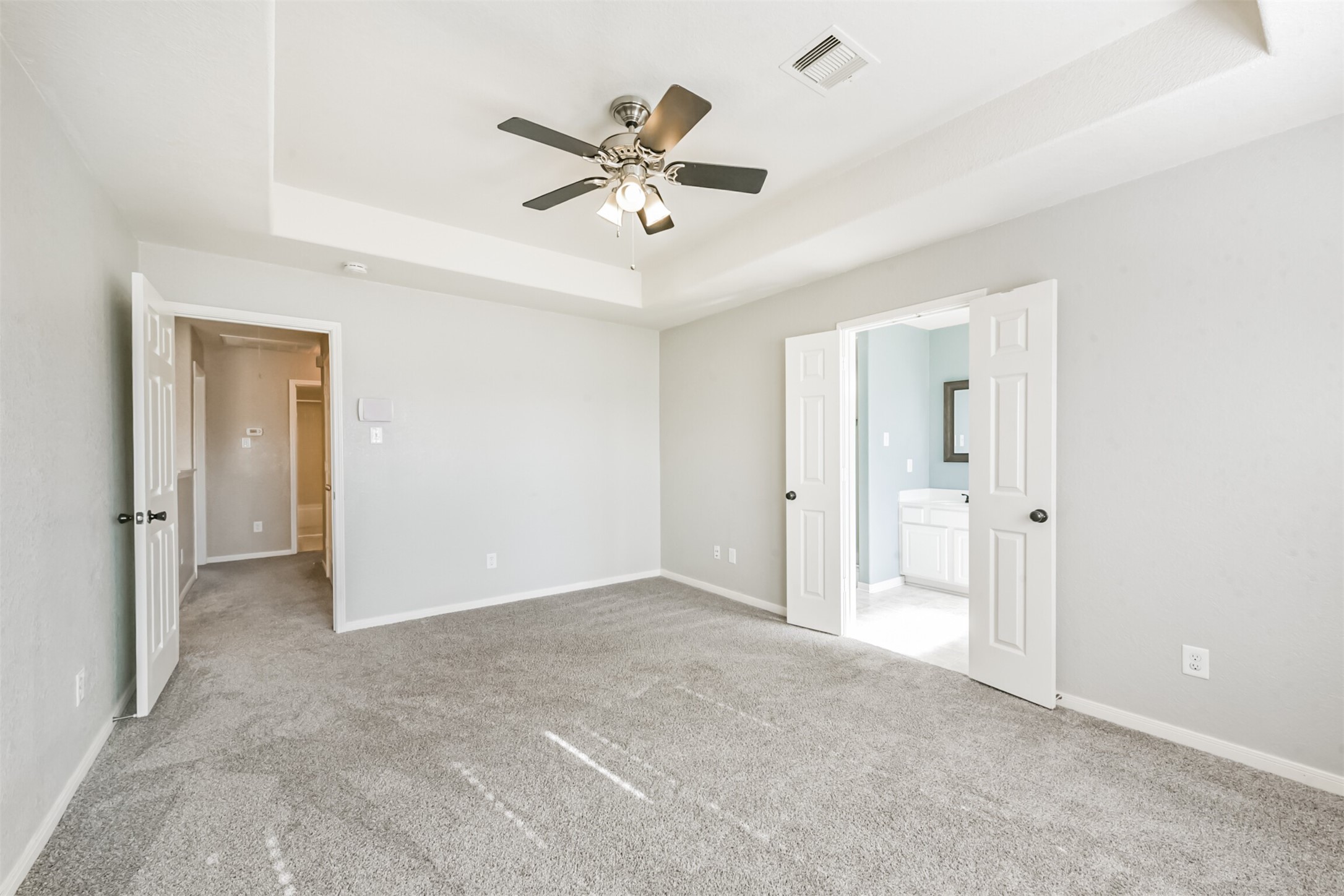 1305 Pinto Pass Alvin, TX 77511 - Photo 23 of 40 wooden floor in an empty room and a ceiling fan