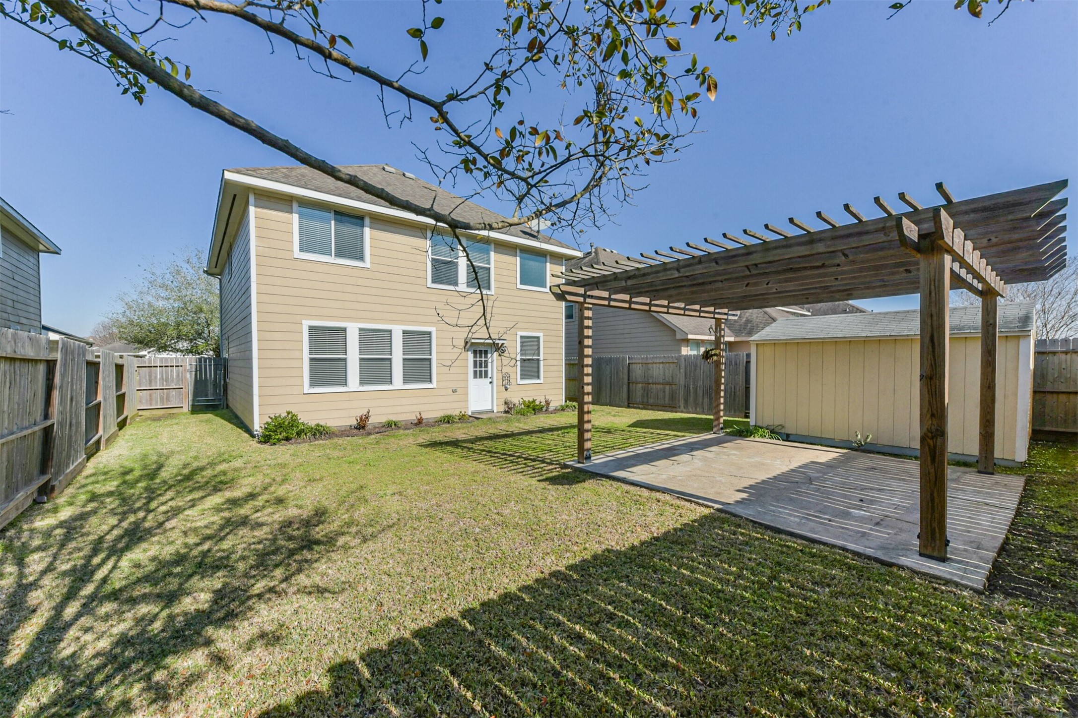 1305 Pinto Pass Alvin, TX 77511 - Photo 37 of 40 a house with garden in front of it