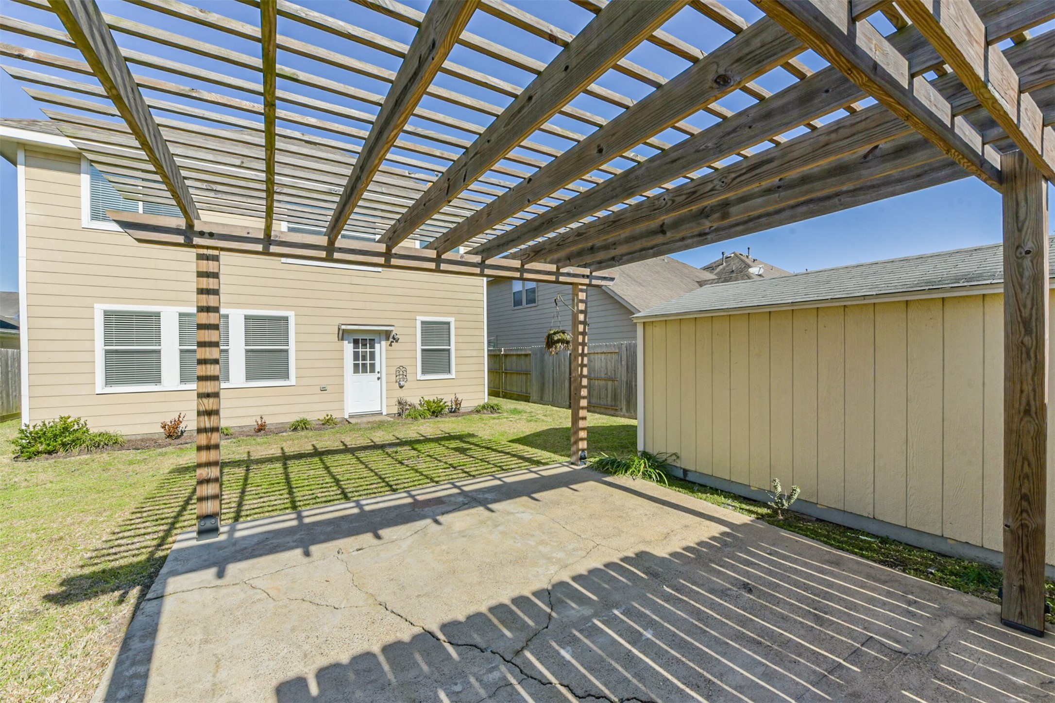 1305 Pinto Pass Alvin, TX 77511 - Photo 39 of 40 a house with trees in front of it