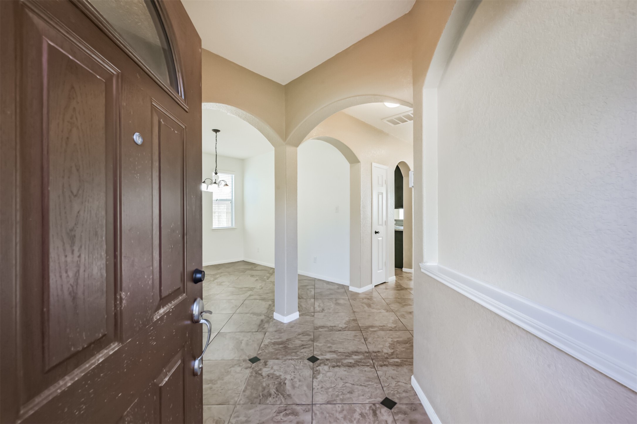 1305 Pinto Pass Alvin, TX 77511 - Photo 6 of 40 a view of a bathroom with mirror