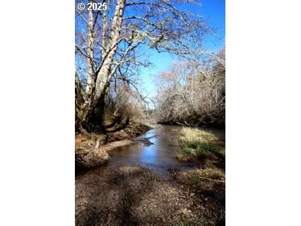 a view of an outdoor space with a lake view