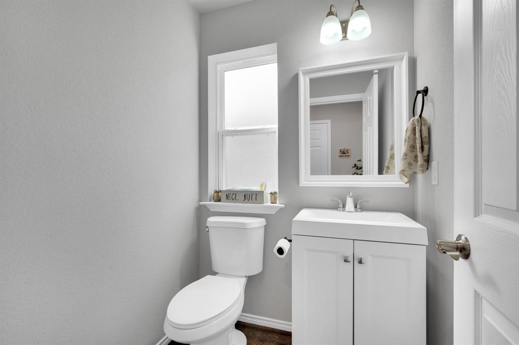 731 East Brown Street Cleburne, TX 76031 - Photo 19 of 39 Downstairs half bath