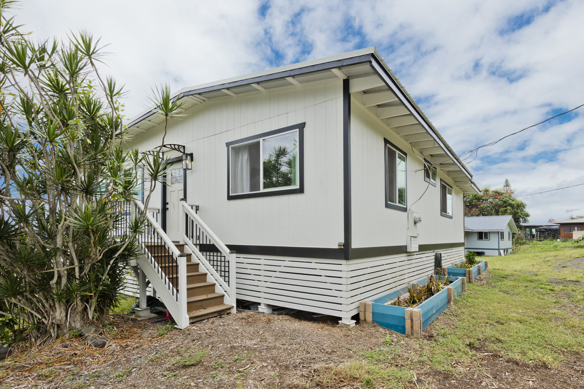 87-2451 Hawaiʻi Belt Road Captain Cook, HI 96704 - Photo 27 of 30 a view of a house with a yard