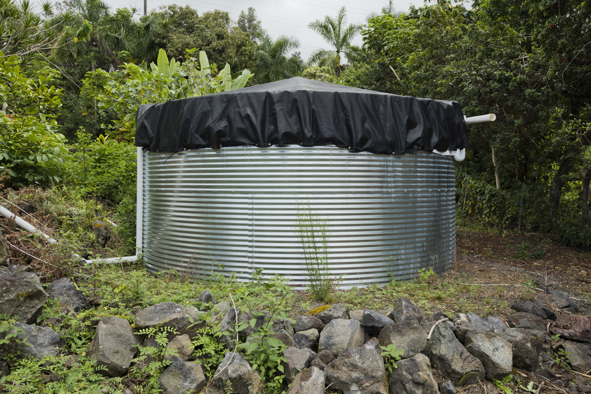 87-2451 Hawaiʻi Belt Road Captain Cook, HI 96704 - Photo 29 of 30 a house view with a backyard space
