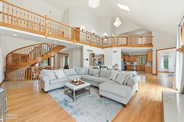 a spacious bathroom with a double vanity sink and a mirror