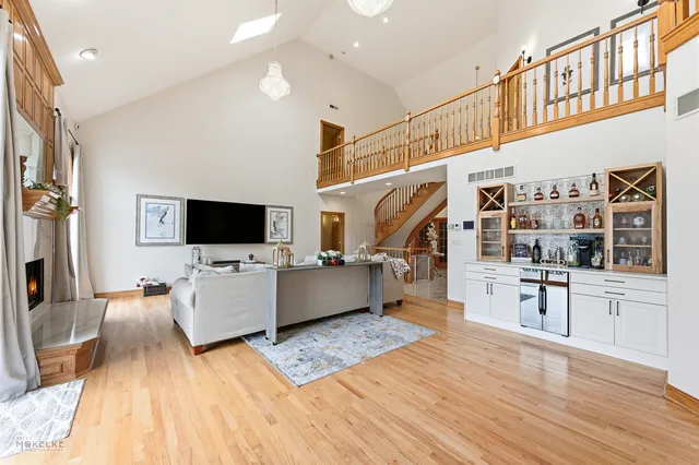 a view of a chair and table in the balcony