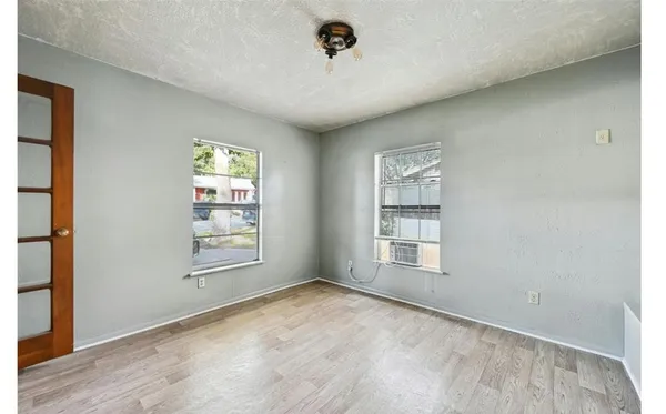 an empty room with windows