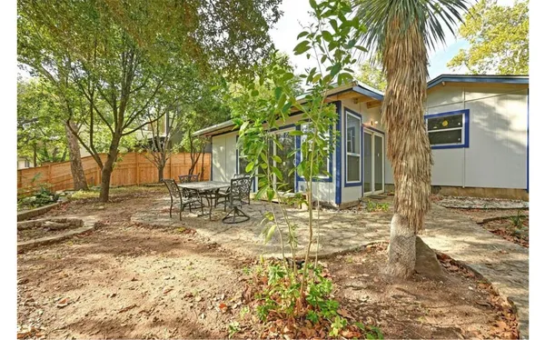 a view of a yard with patio