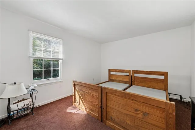 a room with storage and windows