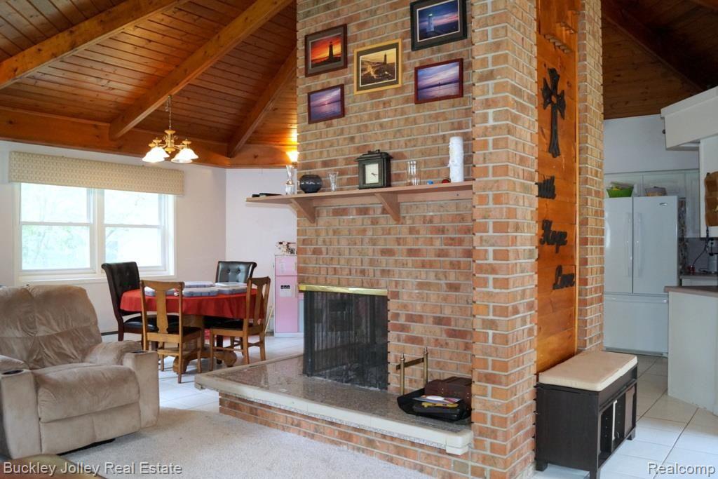 10356 Kress Road Pinckney, MI 48169 - Photo 11 of 29 Walk Around Fireplace