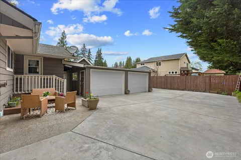 a house view with a garden space