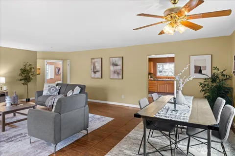 a living room with furniture and a table