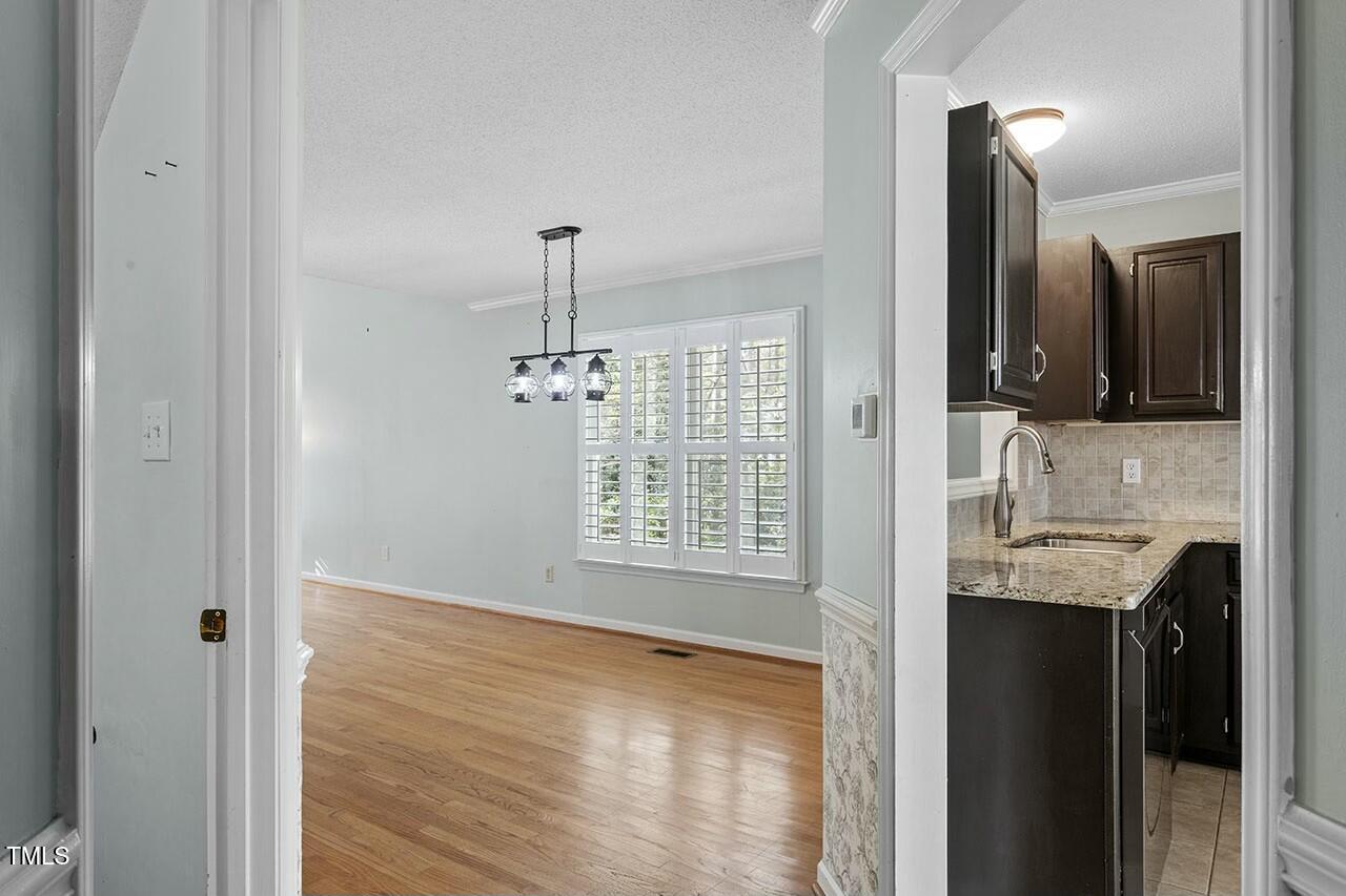1436 Mahonia Court Raleigh, NC 27615 - Photo 9 of 34 View to dining room